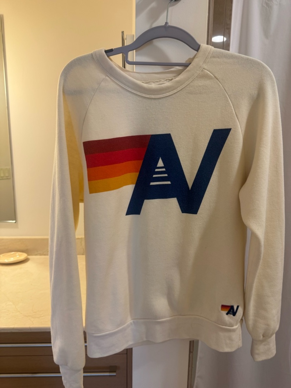 Aviator Nation Cream Sweatshirt with Navy 'AV' and Rainbow Stripes